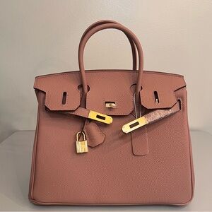 $SOLD$ 30cm Genuine Togo Leather with Gold Hardware.